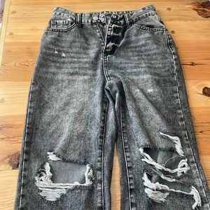 Dark washed ripped jeans on sixe xs in women